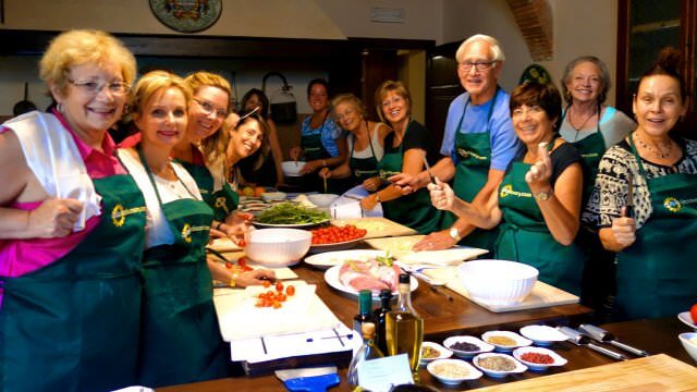 Our guests eager to dive into another half day of cooking fun and learning how to make more Tuscan dishes